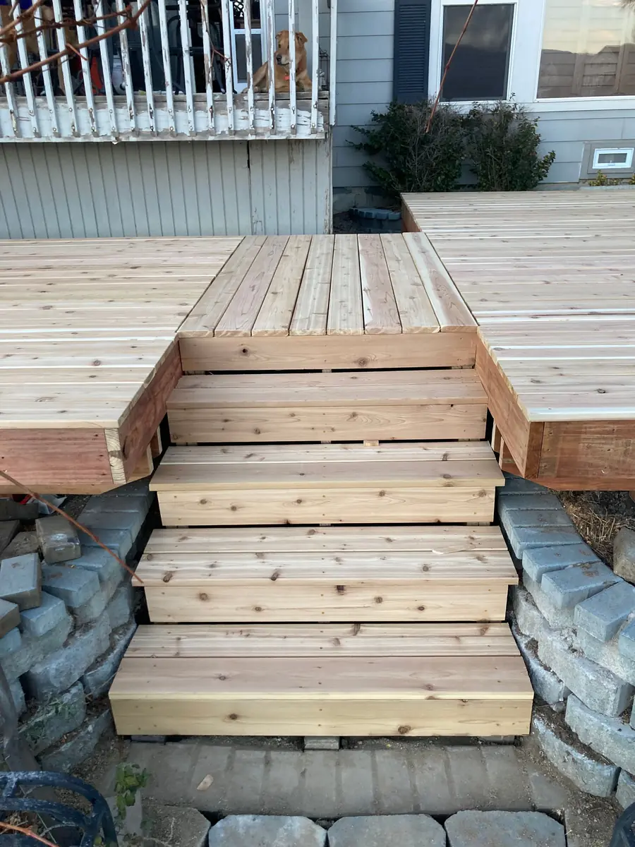 Close-up of cedar deck stairs under construction