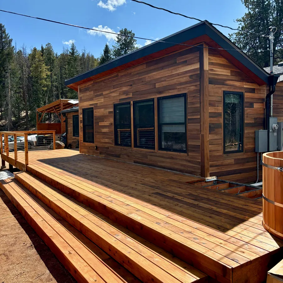 Large deck with wide staircase in Evergreen, CO