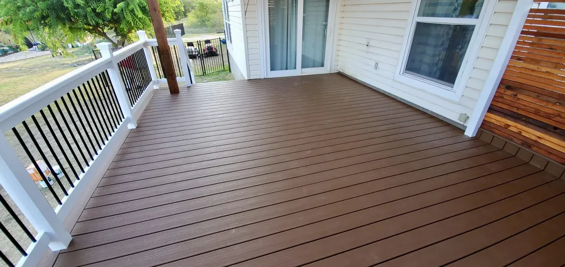 Trex composite deck with custom metal and painted wood railing