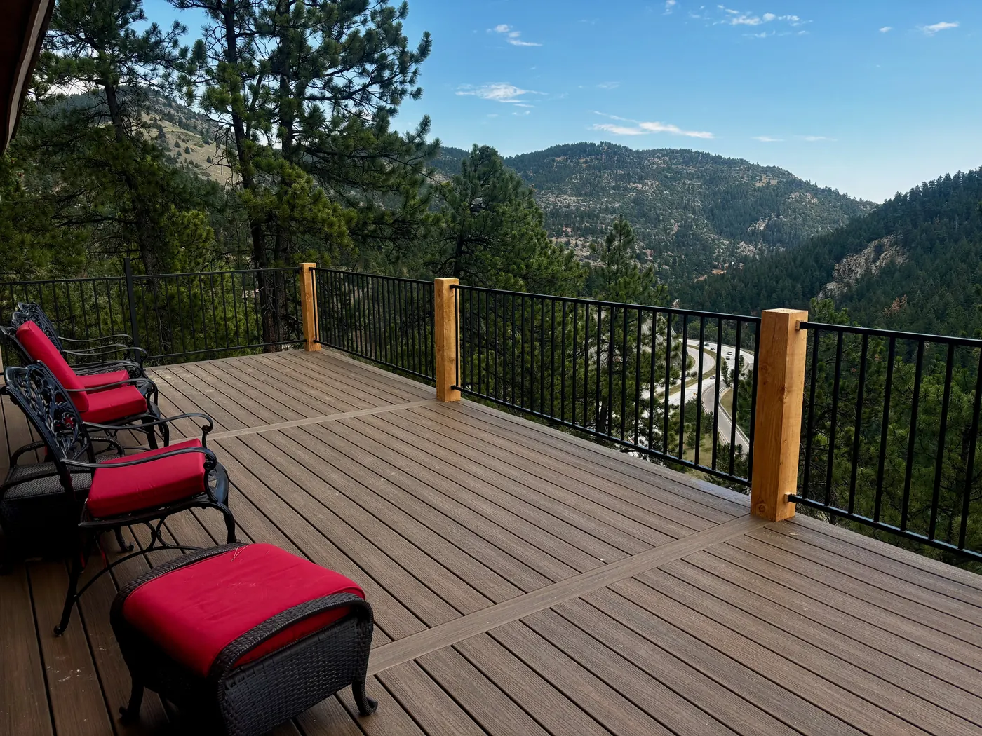 Composite deck built on steep terrain in Morrison, CO, overlooking the mountains