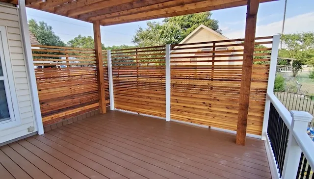 Cedar privacy wall with white posts