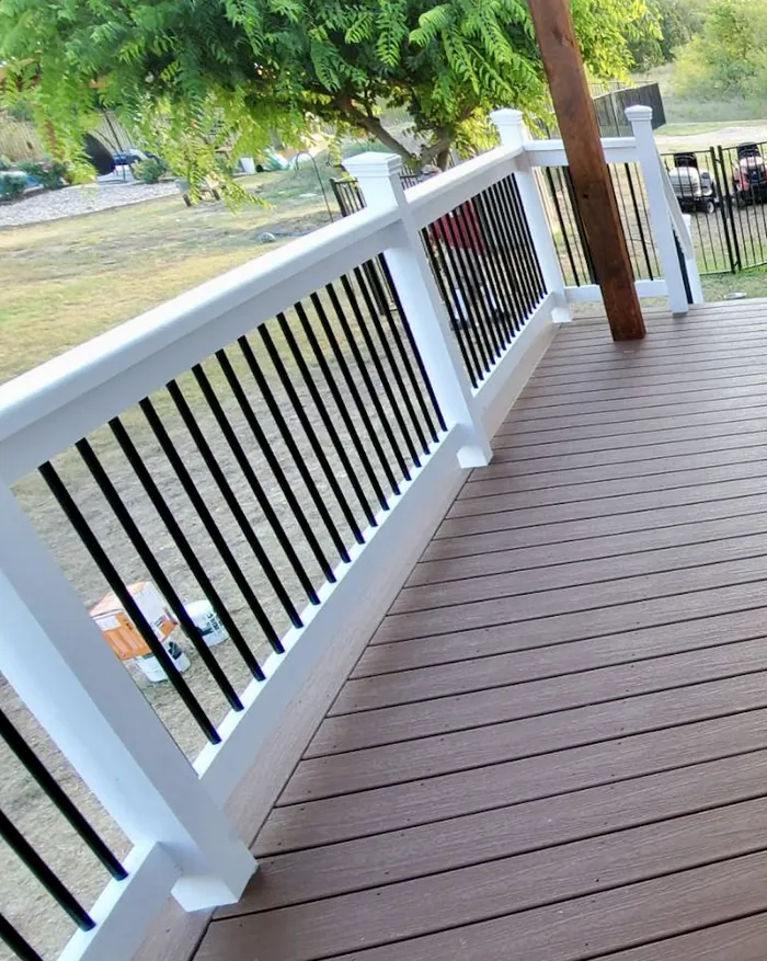 Painted white composite railing with metal balusters