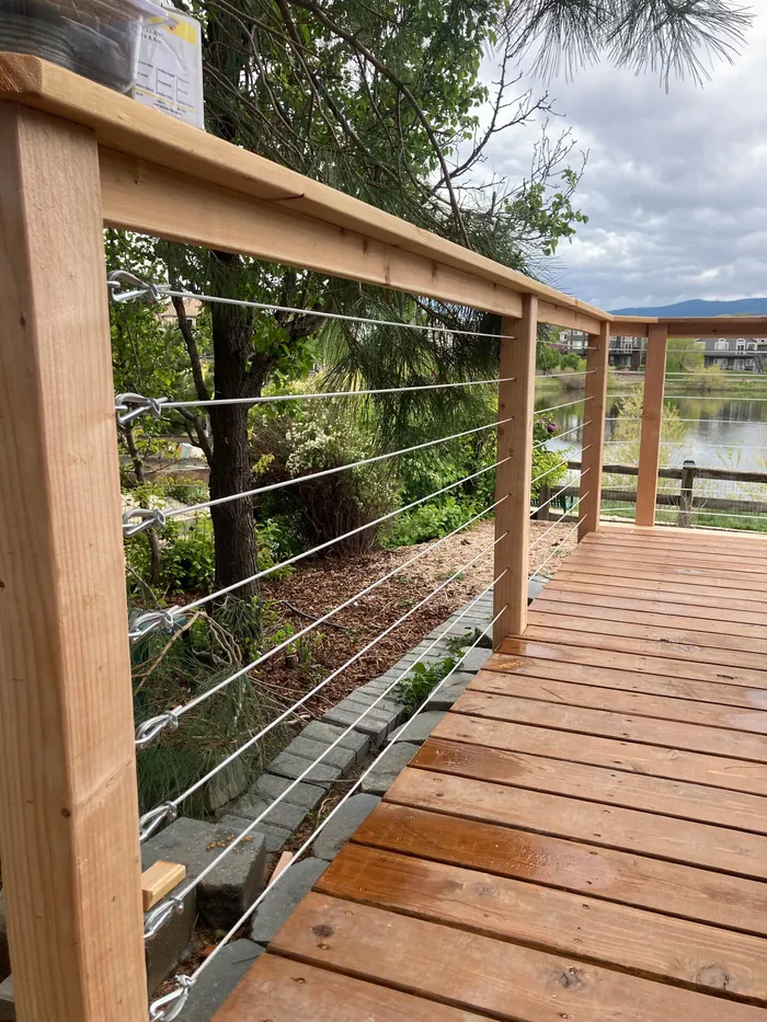 Steel cable railing on a cedar deck